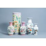 Four various Chinese famille rose vases and a 'dragons' umbrella stand, 20th C.