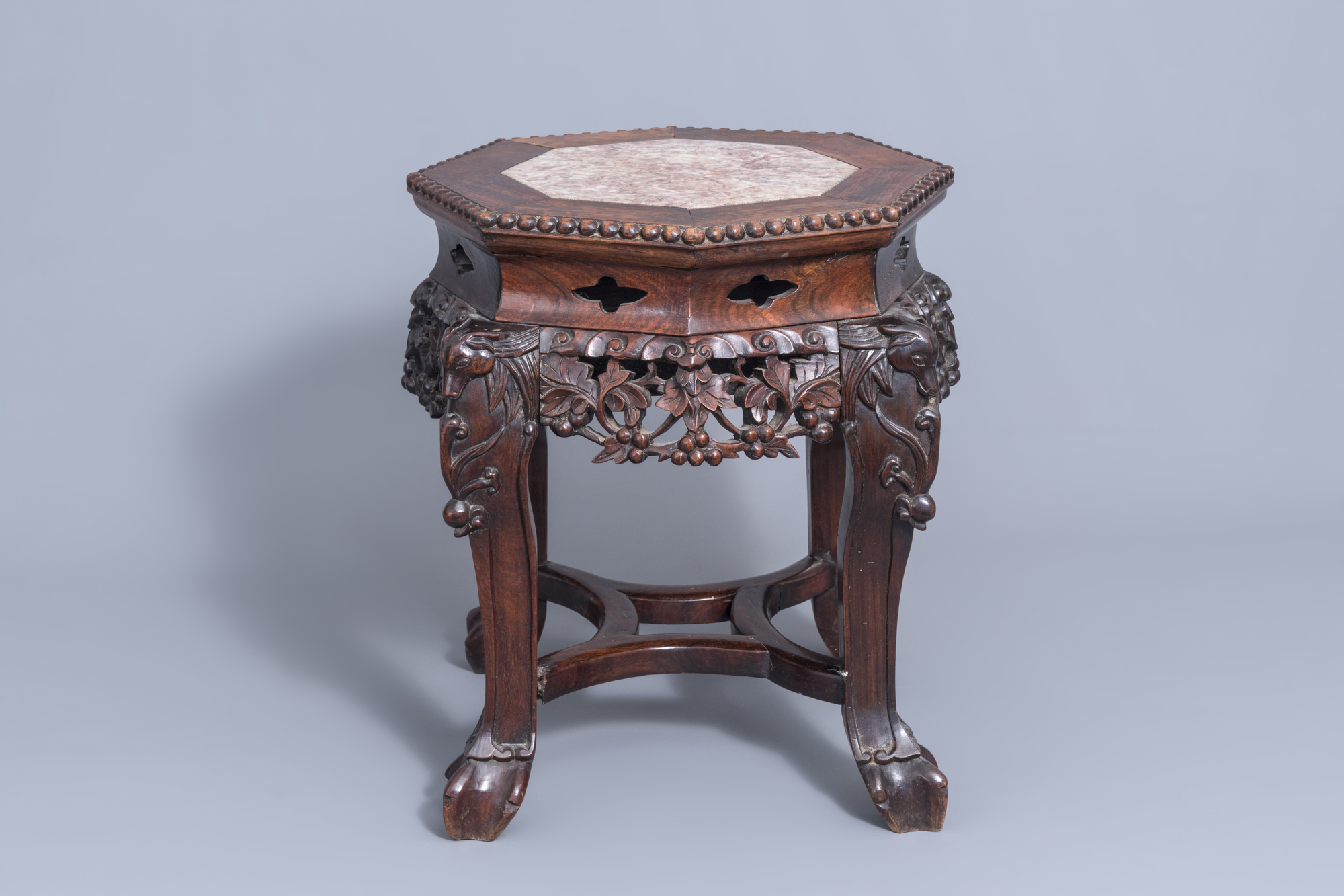 A collection of Chinese wooden stands and a carved wooden stand with marble top, 19th/20th C. - Image 11 of 14