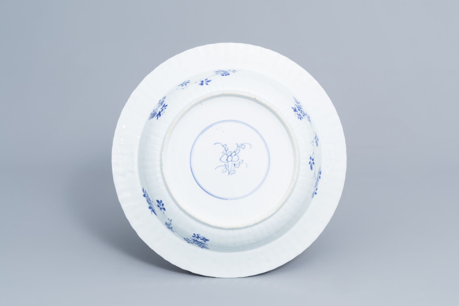 A pair of Chinese blue and white 'pheasant' chargers, Kangxi - Image 3 of 8