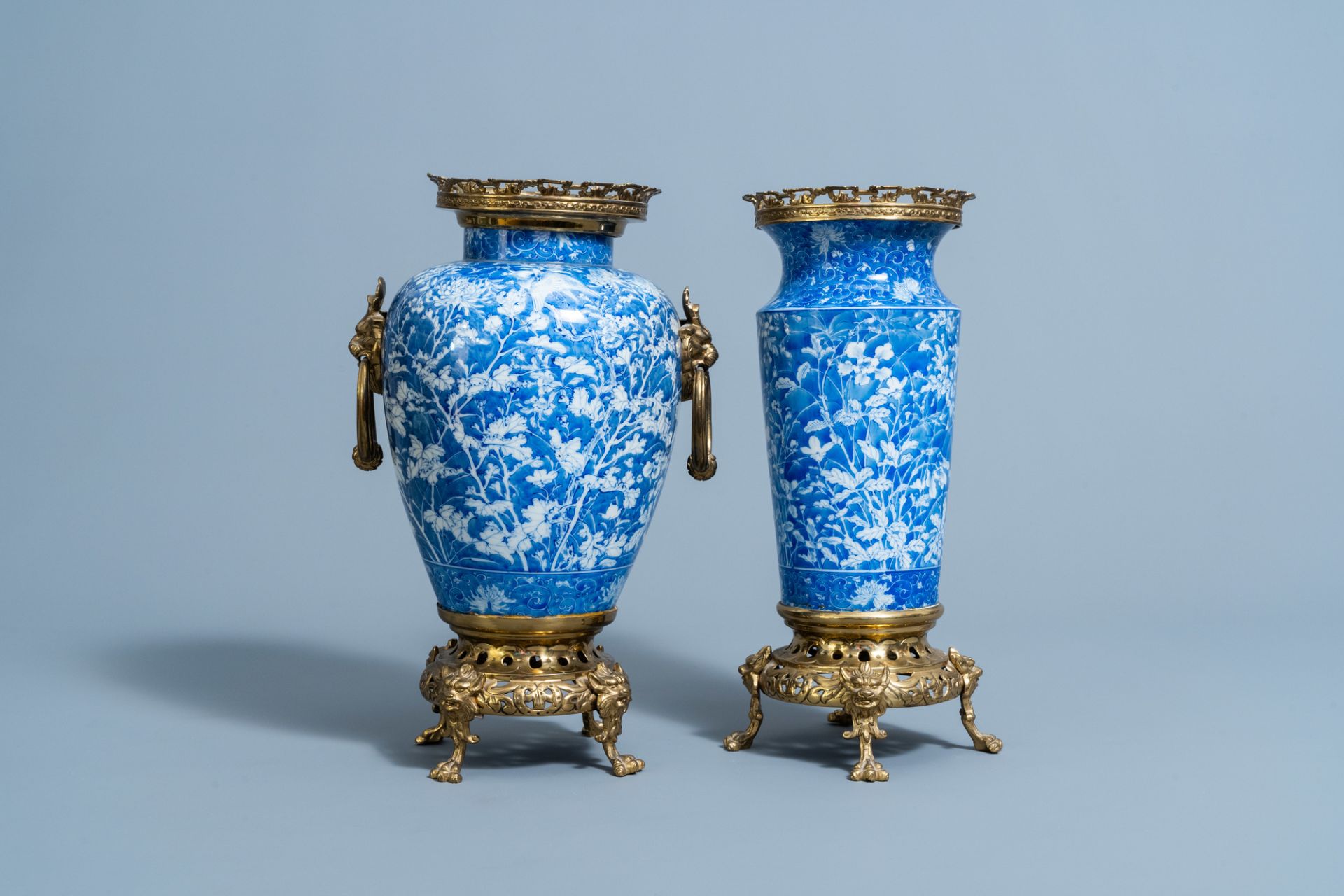 Two Japanese blue and white gilt brass mounted Arita vases, Meiji/Taisho, 20th C.