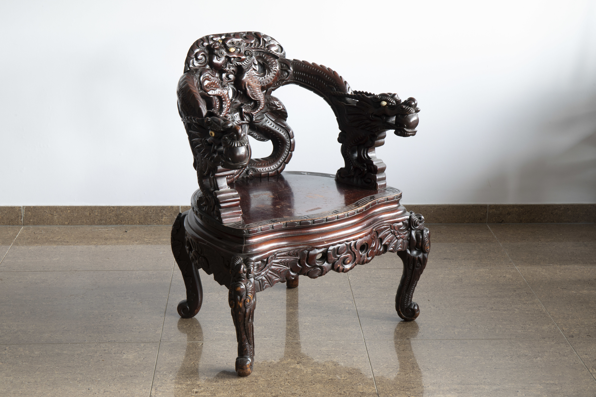 A Chinese or Japanese carved wooden 'dragons' chair, 20th C. - Image 2 of 8