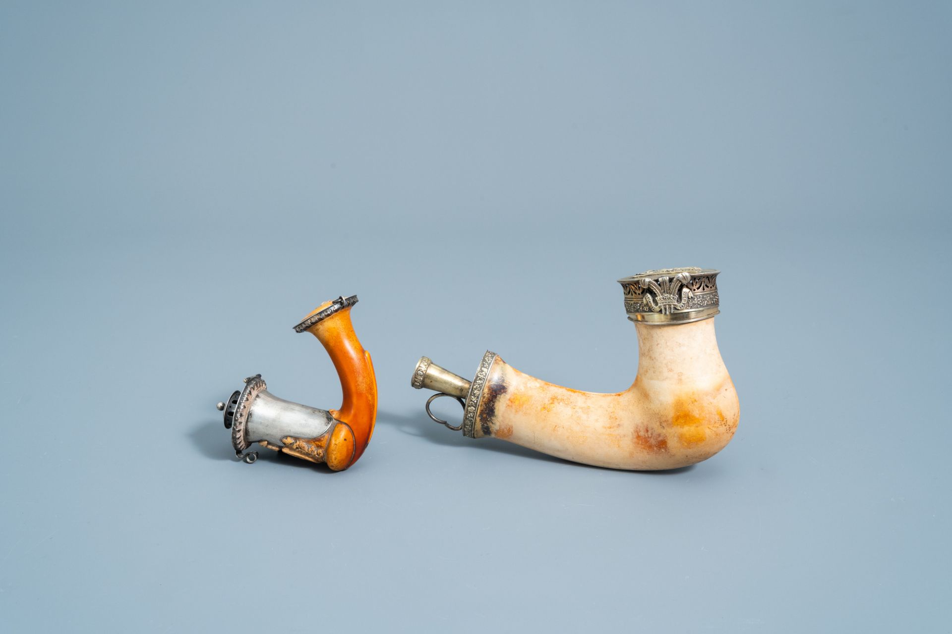 A gilt silver mounted meerschaum pipe with the 'Prince of Wales' feathers' and one with symbols of t