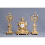 An exceptional French Historism three-piece gilt bronze clock garniture, Charpentier mark, 19th C.