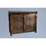 An oak wooden buffet dresser with floral design and lion heads, the Netherlands, 17th C. and later