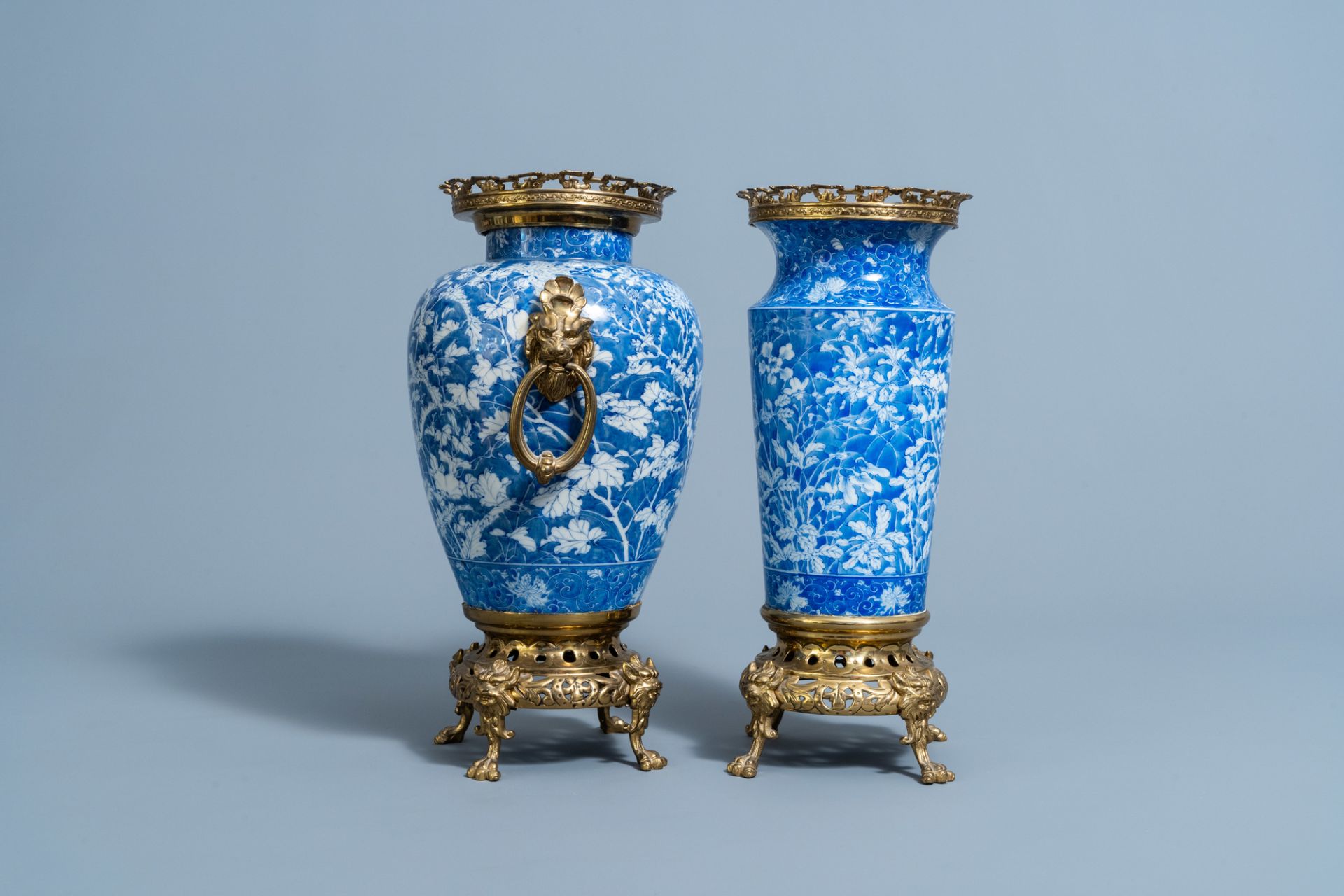 Two Japanese blue and white gilt brass mounted Arita vases, Meiji/Taisho, 20th C. - Image 5 of 7