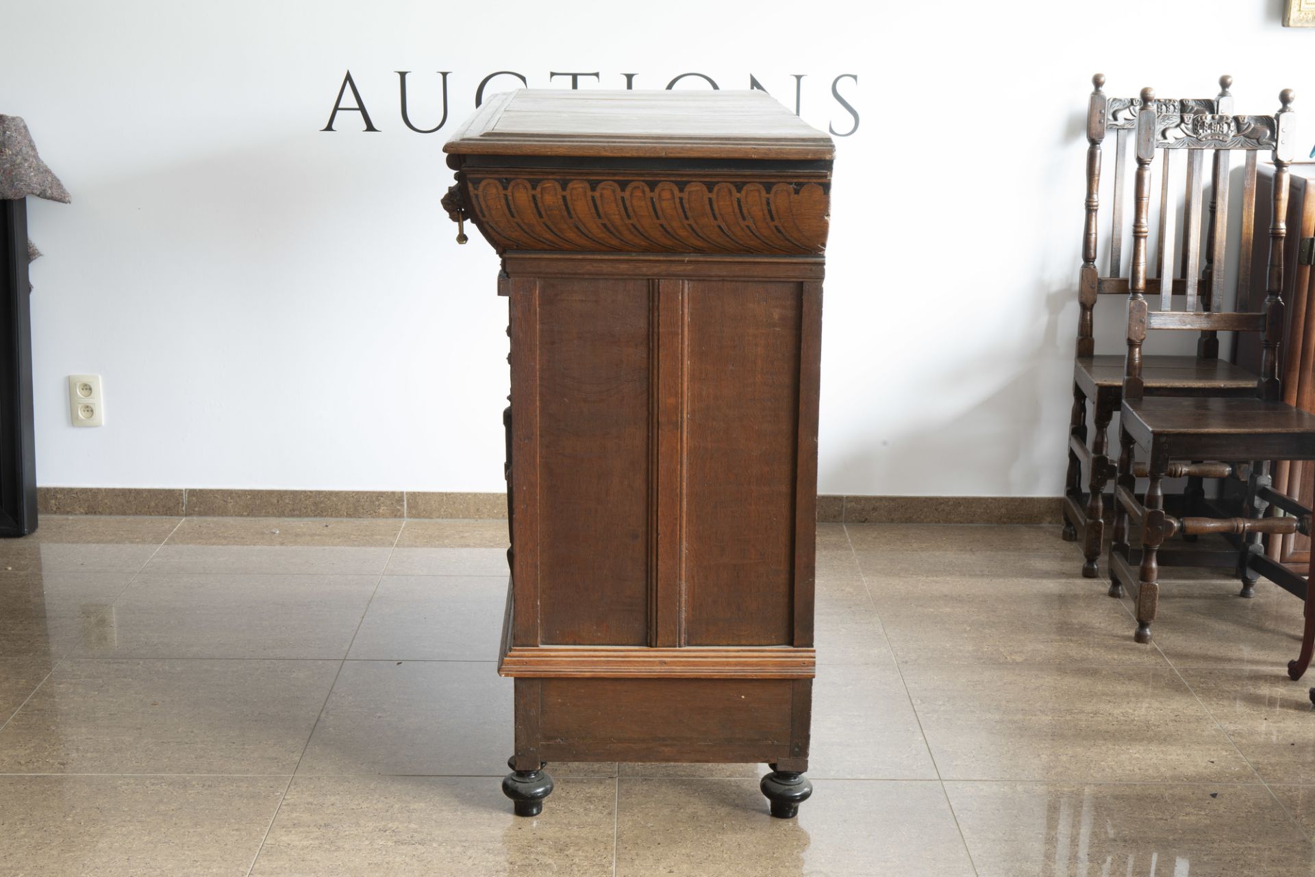 A Flemish oak wooden buffet dresser with architectural design and lion heads, partly 16th C. and lat - Image 6 of 7