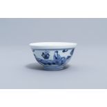 A Chinese blue and white bowl with figures in a landscape all around, Yongzheng mark and period