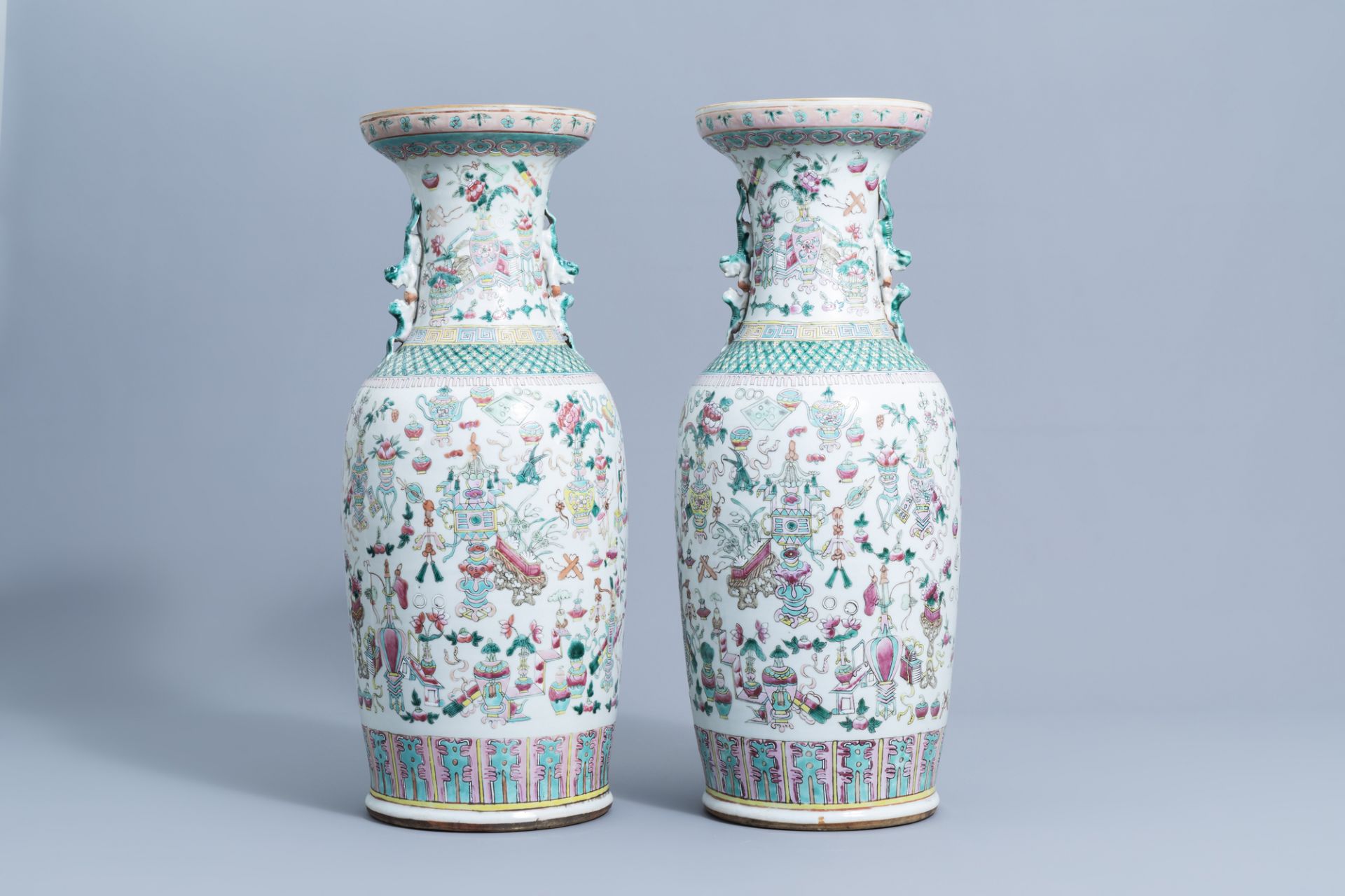 A pair of Chinese famille rose vases with antiquities design, 19th C. - Image 3 of 6