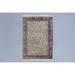 A large Persian Kerman rug with animals and floral design, wool on cotton, mid 20th C.