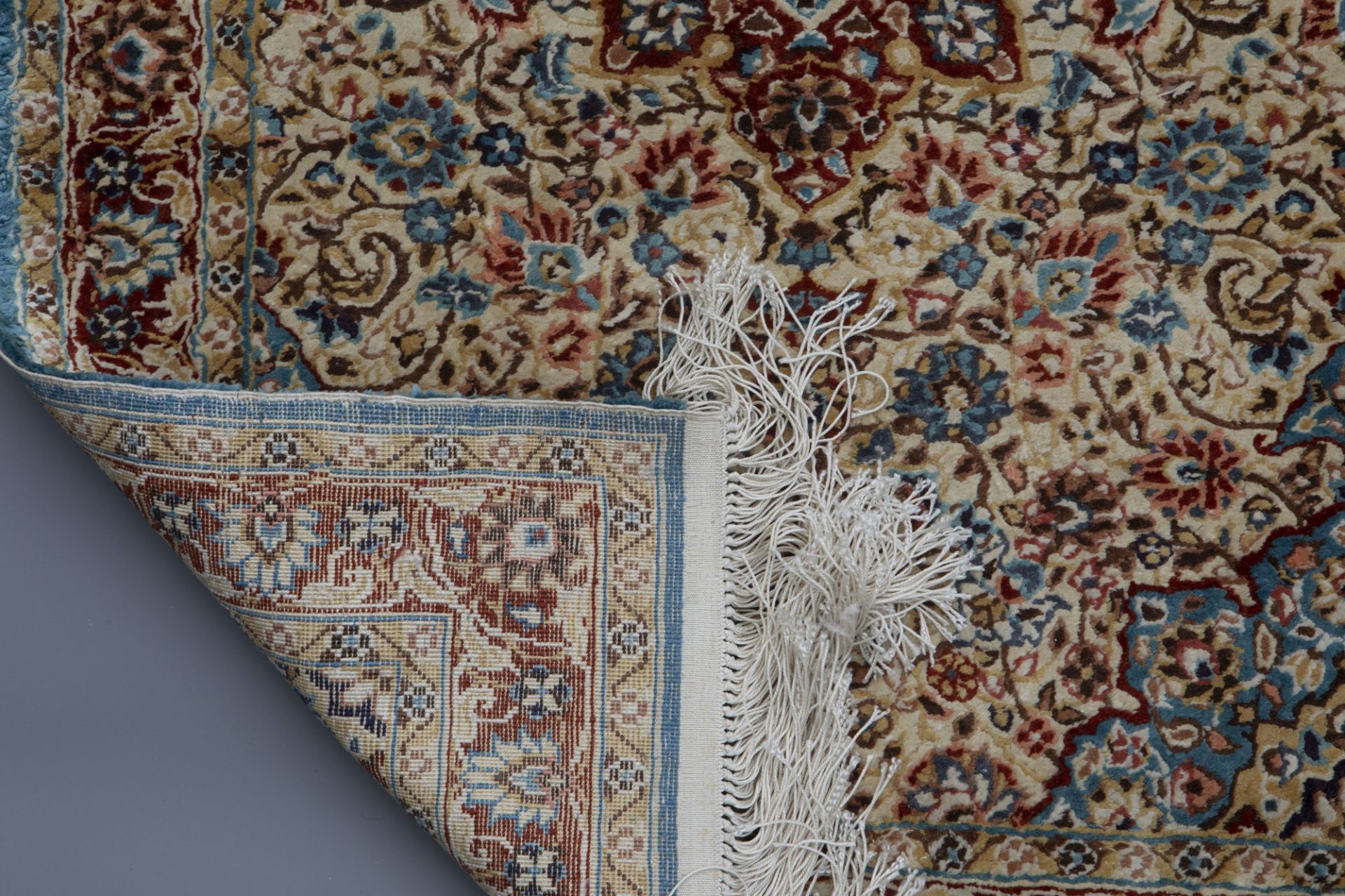 Three Oriental rugs with floral design and a central medallion, silk on cotton, 20th C. - Image 3 of 5