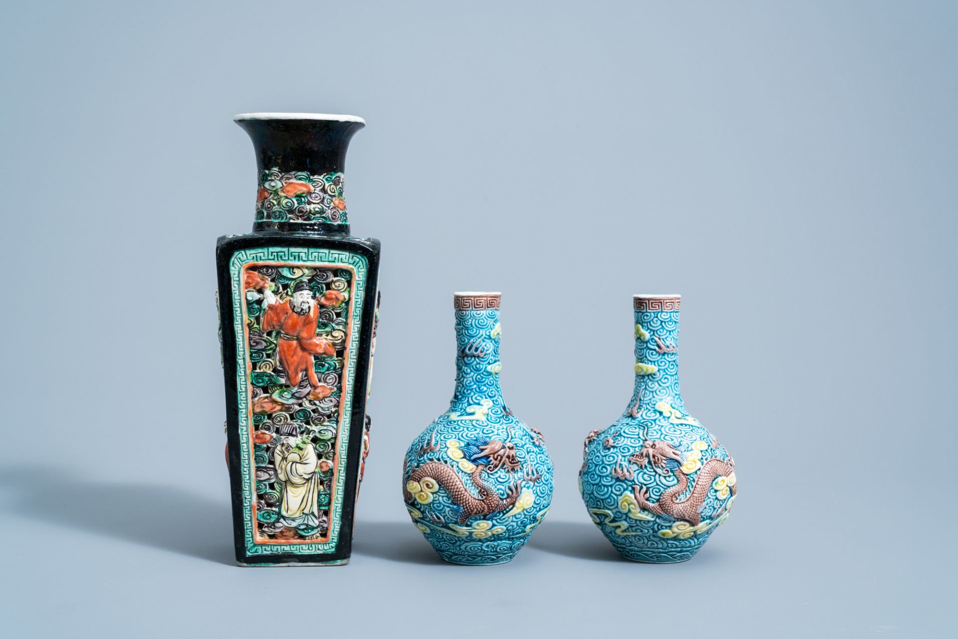 A pair of Chinese polychrome 'dragon' vases and a quadrangular 'Immortals' vase, 19th/20th C. - Image 2 of 7