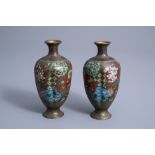 A pair of fine Japanese cloisonne vases with floral design, Meiji, 19th/20th C.