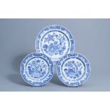 Three Chinese blue and white chargers with antiquities and floral design, Yongzheng