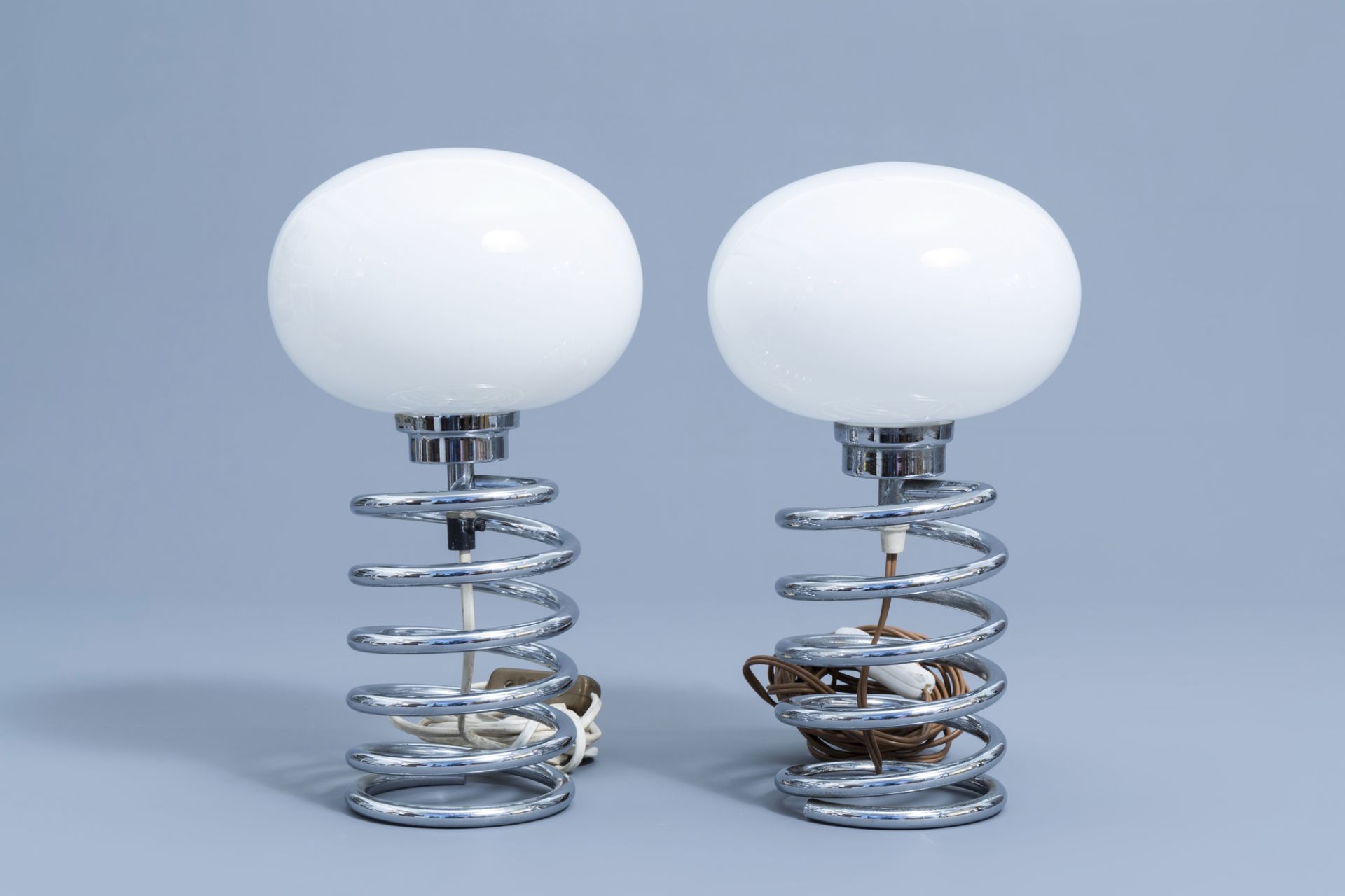 A pair of chromed metal spiral table lamps, presumably Ingo Mauer for M-Design, Germany, 1970s