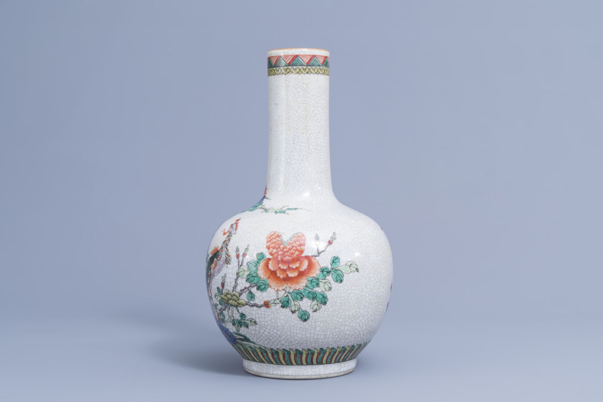 A Chinese bottle shaped Nanking crackle famille verte vase and two warrior jars, 19th/20th C. - Image 13 of 15