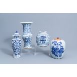 Four various Chinese blue and white vases and jars and covers, 19th/20th C.