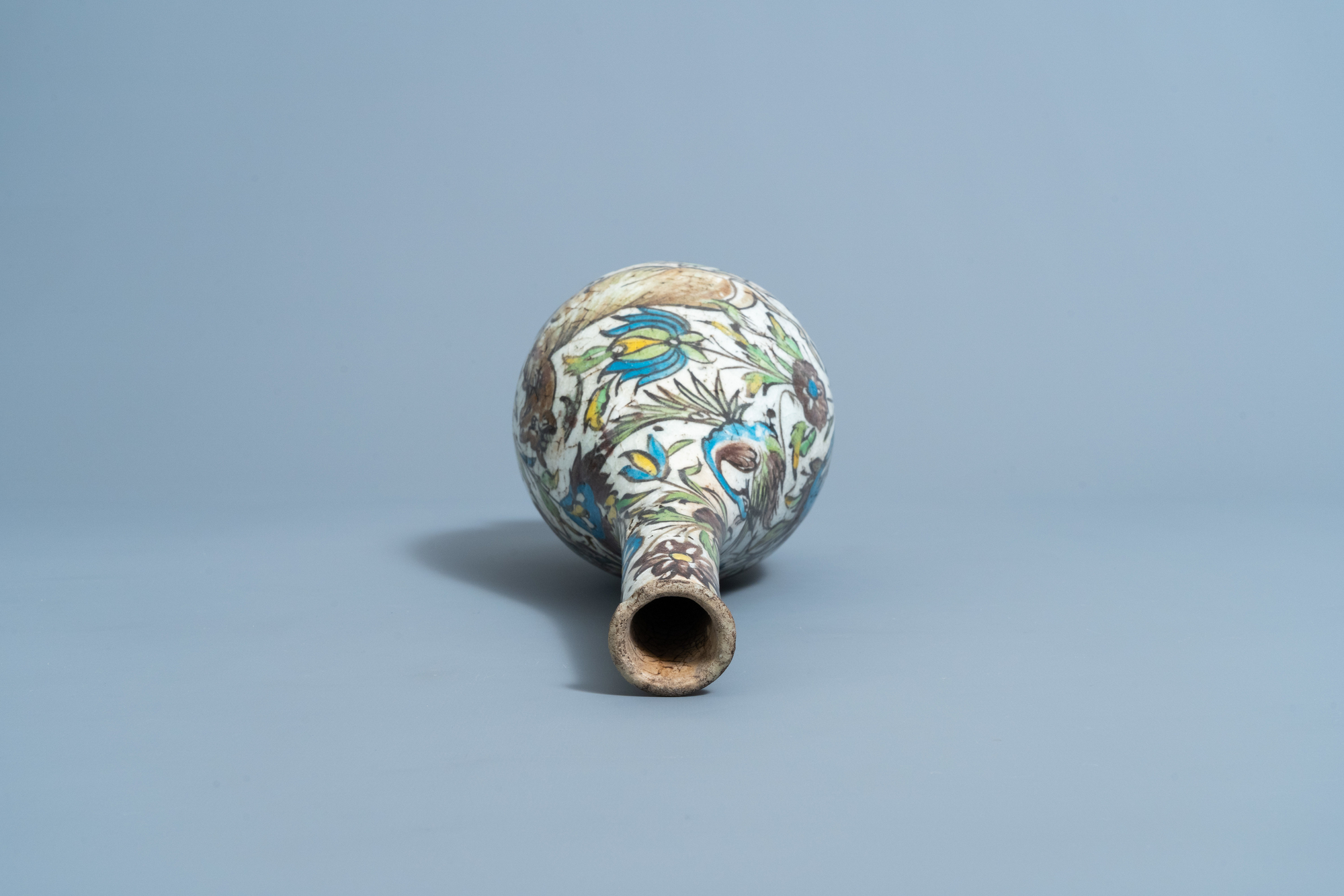 A Qajar polychrome bottle shaped vase with animals and floral design, Iran, 19th C. - Image 5 of 6