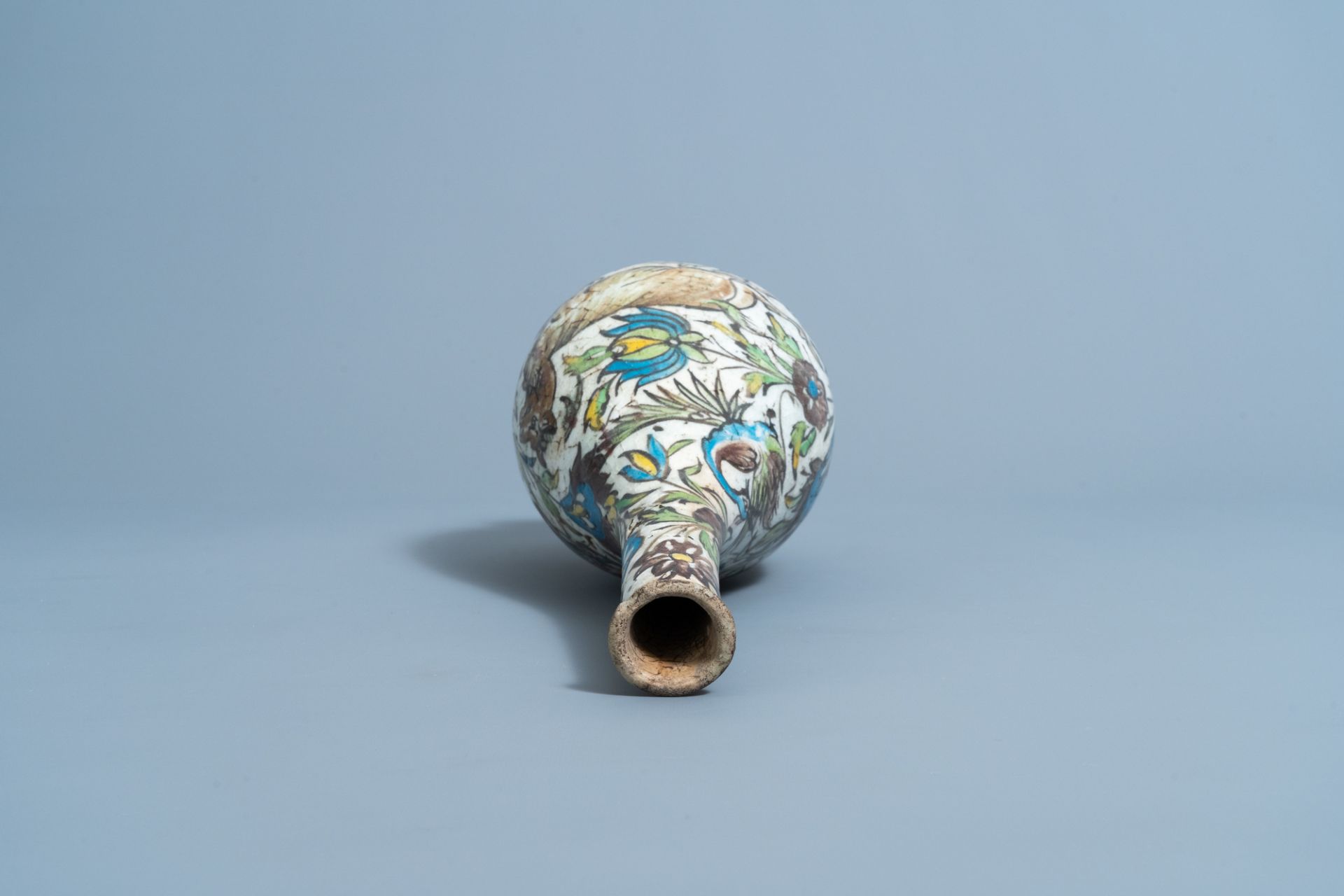 A Qajar polychrome bottle shaped vase with animals and floral design, Iran, 19th C. - Image 5 of 6