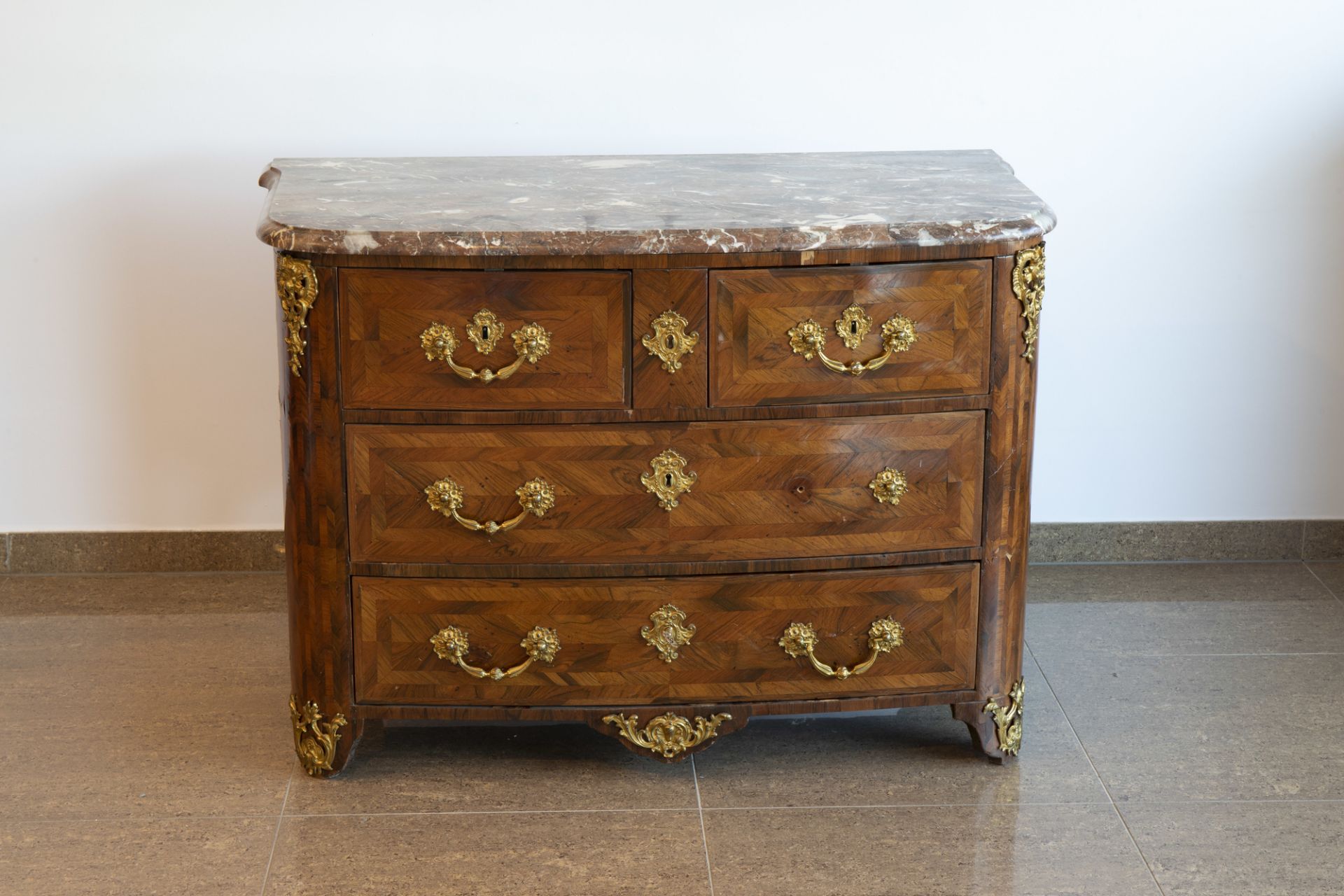 A French Regence style gilt bronze mounted chest of drawers with marble top, 18th C. - Image 3 of 8