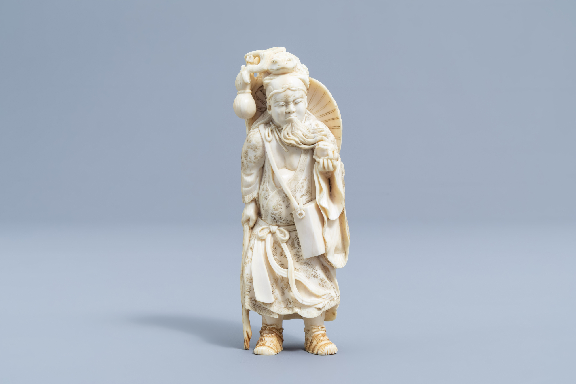 A Japanese ivory okimono of Gama Sennin, Meiji, 19th C. - Image 3 of 11