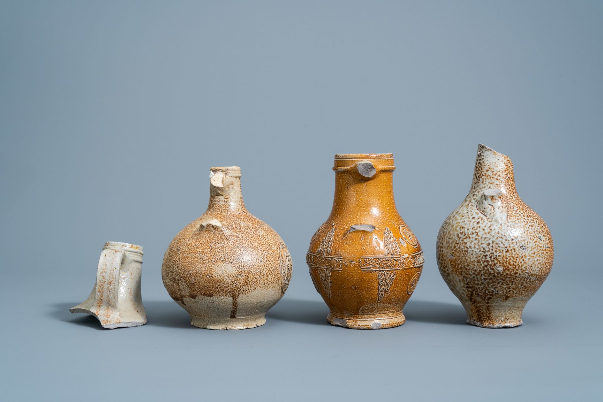 Three German stoneware bellarmine jugs and a neck fragment, 16th/17th C. - Image 5 of 8