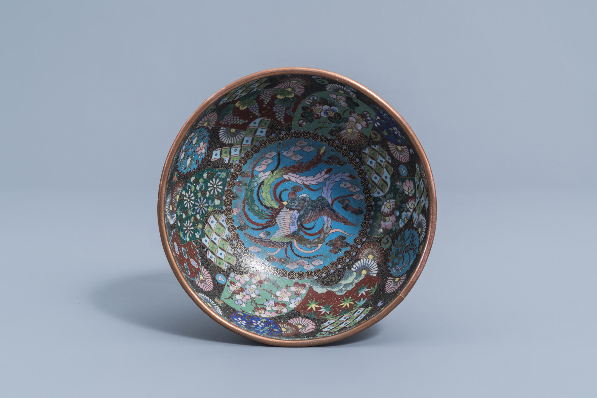 A Japanese cloisonne bowl with a phoenix, butterflies and floral design, Meiji, ca. 1900 - Image 6 of 7