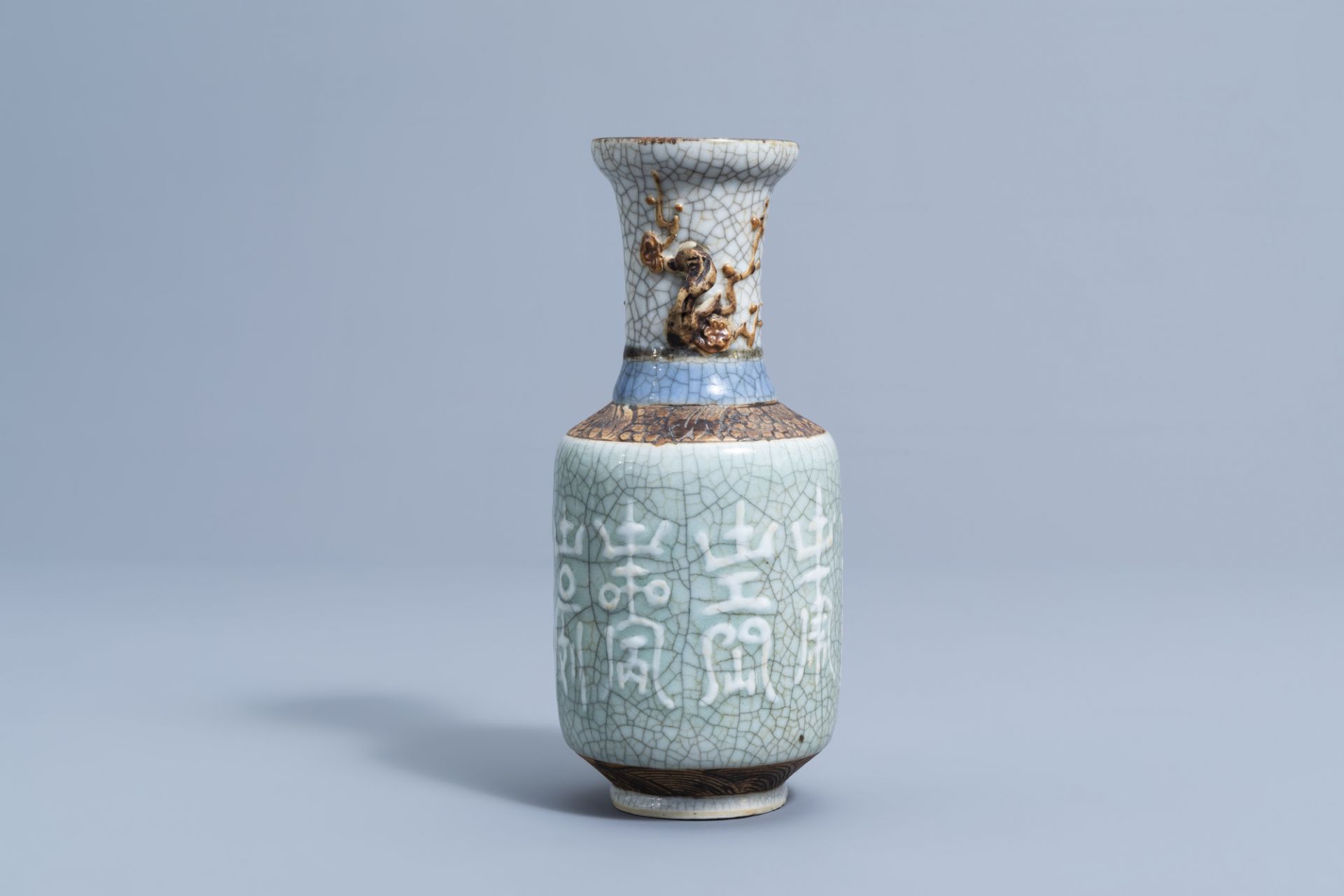 A Chinese Nanking crackle glazed celadon vase with relief design, 19th C. - Image 4 of 6