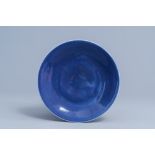 A Chinese monochrome 'sacrificial blue' plate, Qianlong