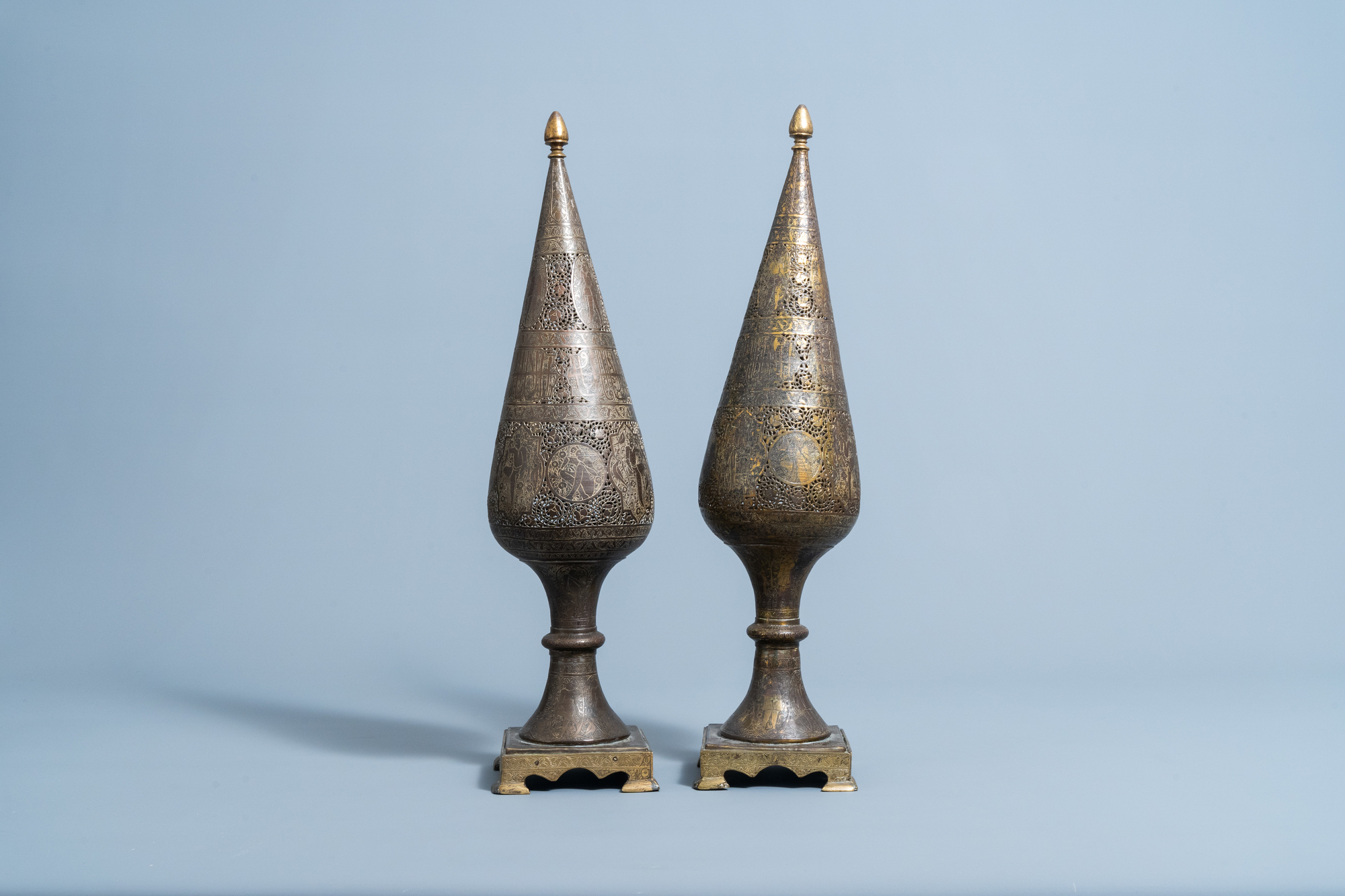 A pair of reticulated gilt bronze cone shaped ornaments with figures and calligraphy, Qajar, Iran, 1 - Image 5 of 7