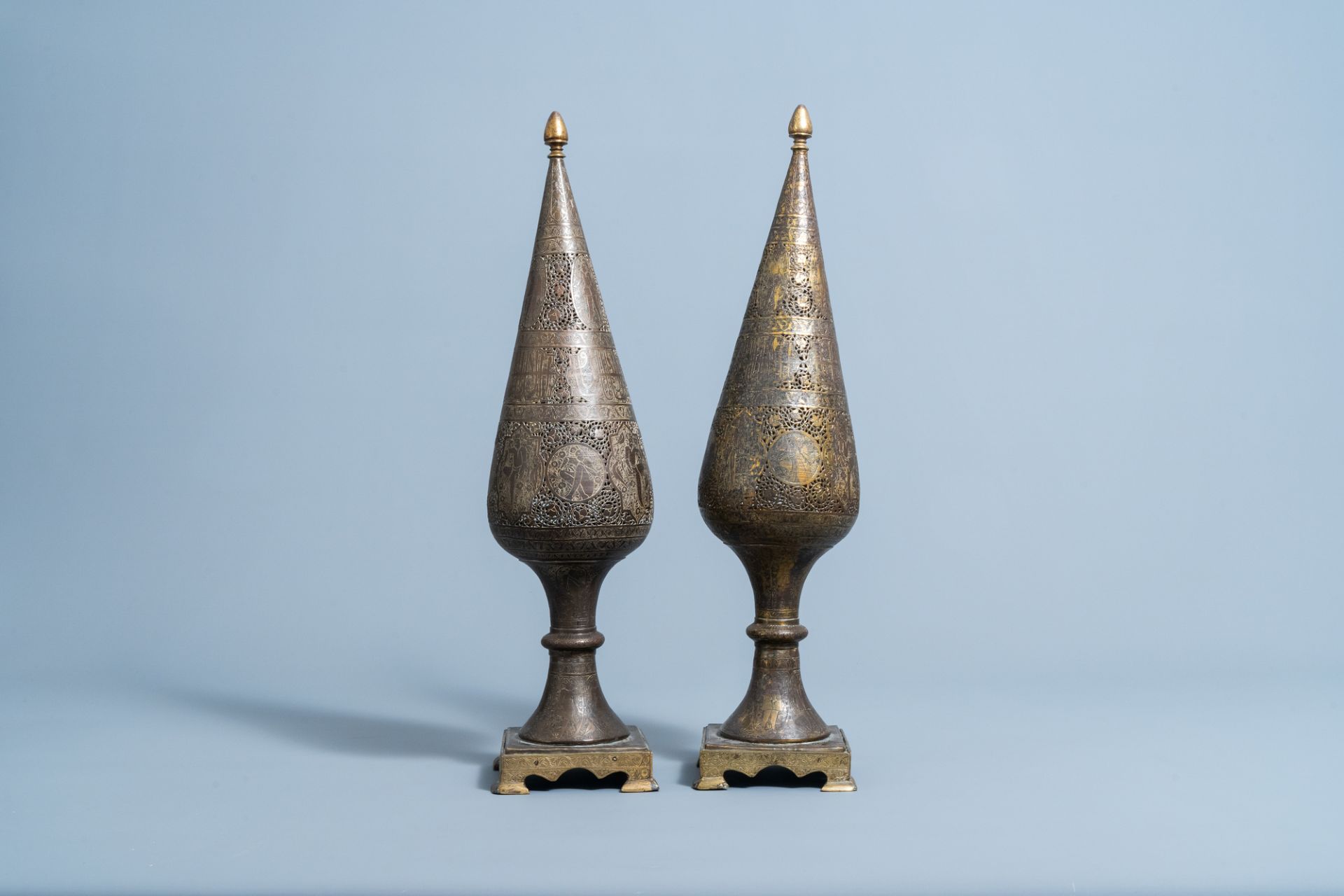 A pair of reticulated gilt bronze cone shaped ornaments with figures and calligraphy, Qajar, Iran, 1 - Image 5 of 7