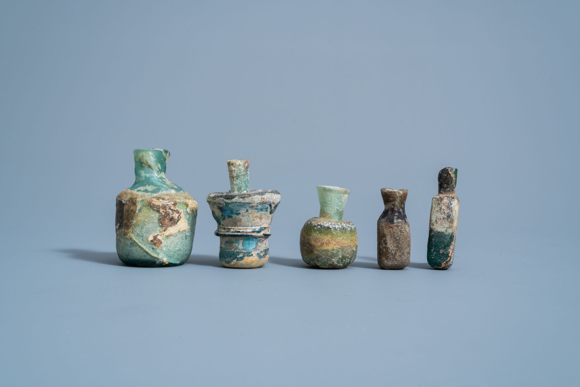 Five various soda glass bottles, jars and flasks, Roman period - Image 3 of 5