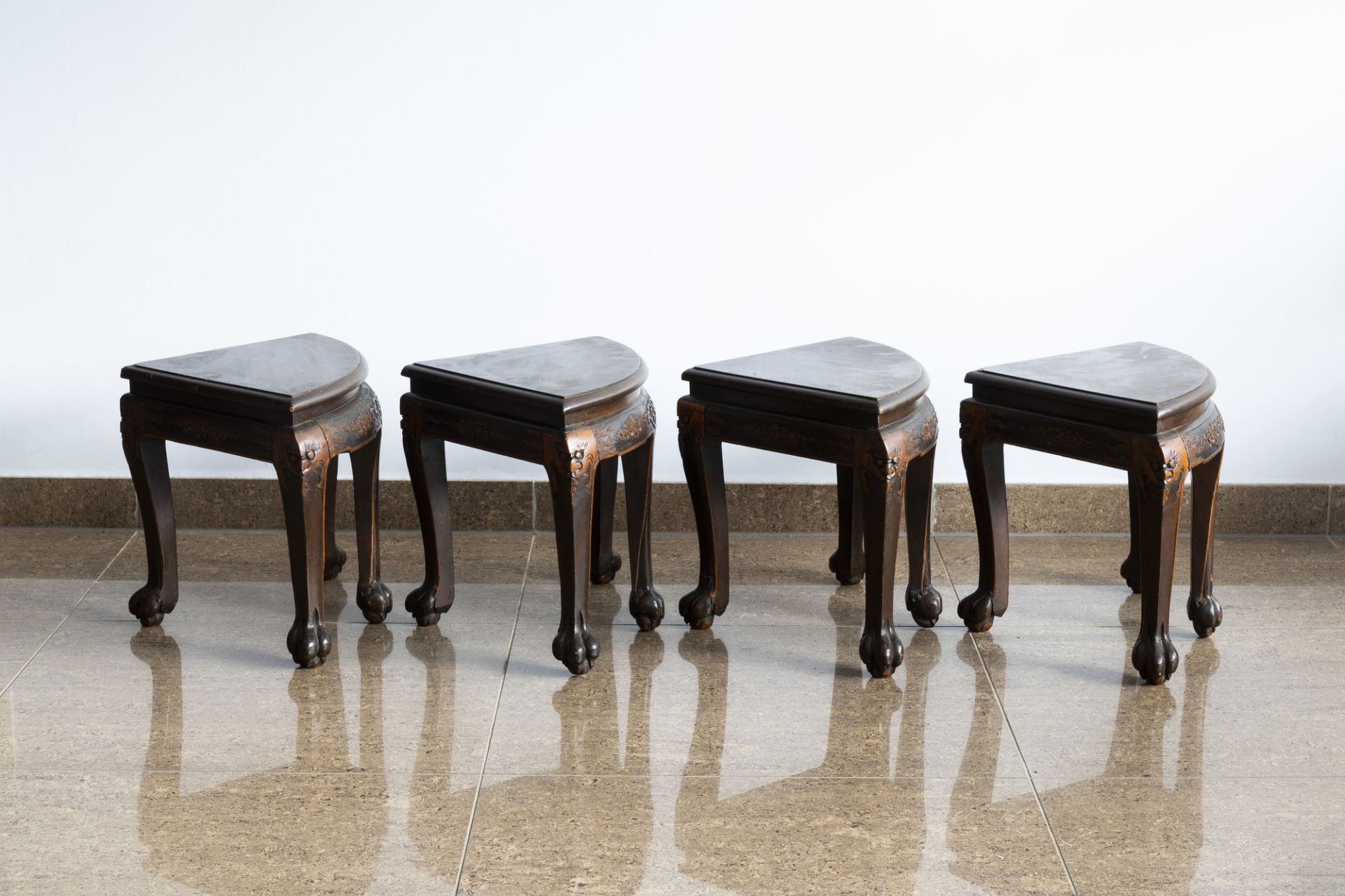 A Chinese wooden coffee table and four stools with relief design, 20th C. - Image 11 of 13