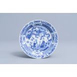 A Chinese blue and white dish with figures and phoenixes in a landscape, Kangxi