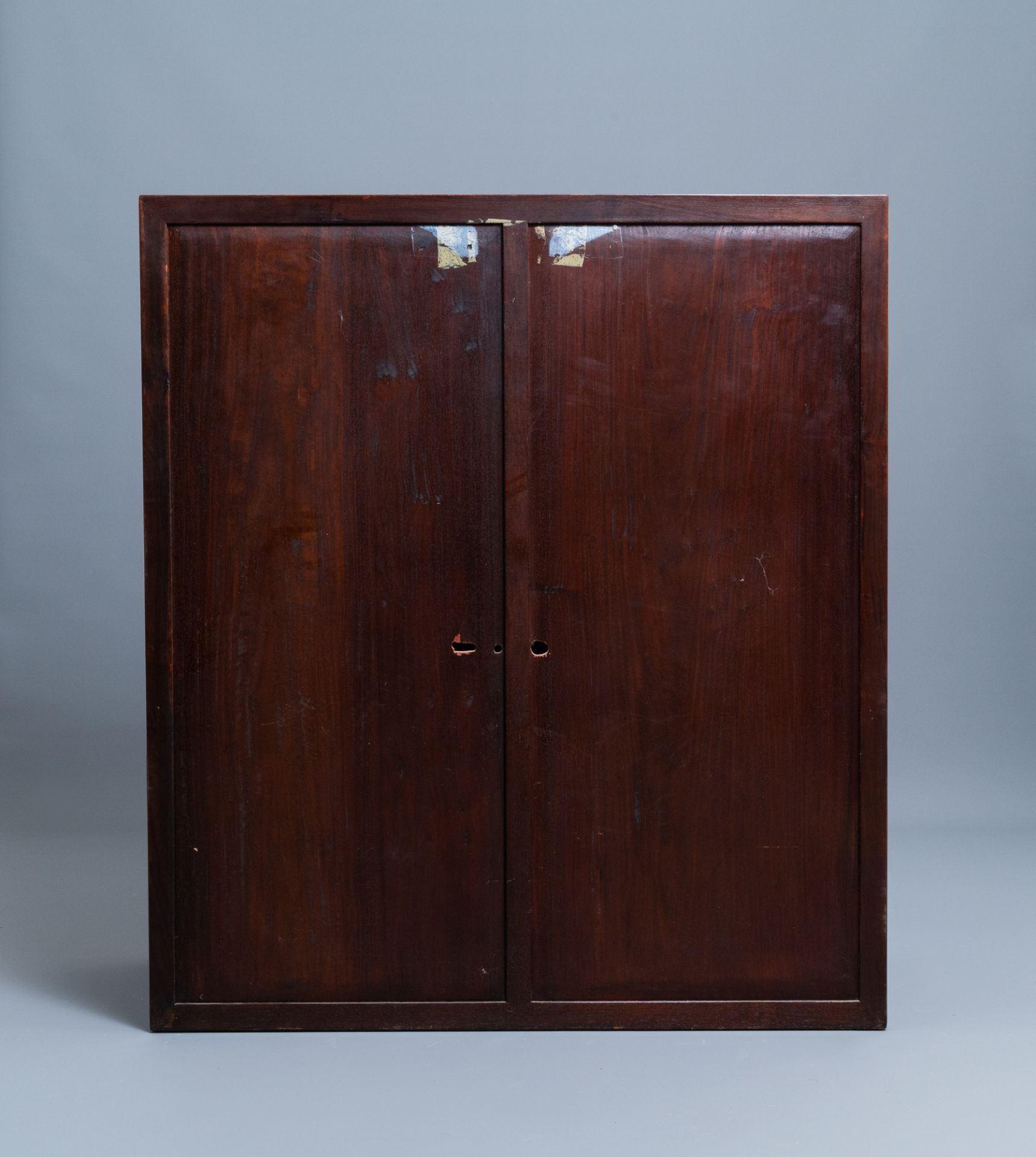 A Chinese wooden two-door cupboard with carved floral panels, 19th C. - Image 7 of 12