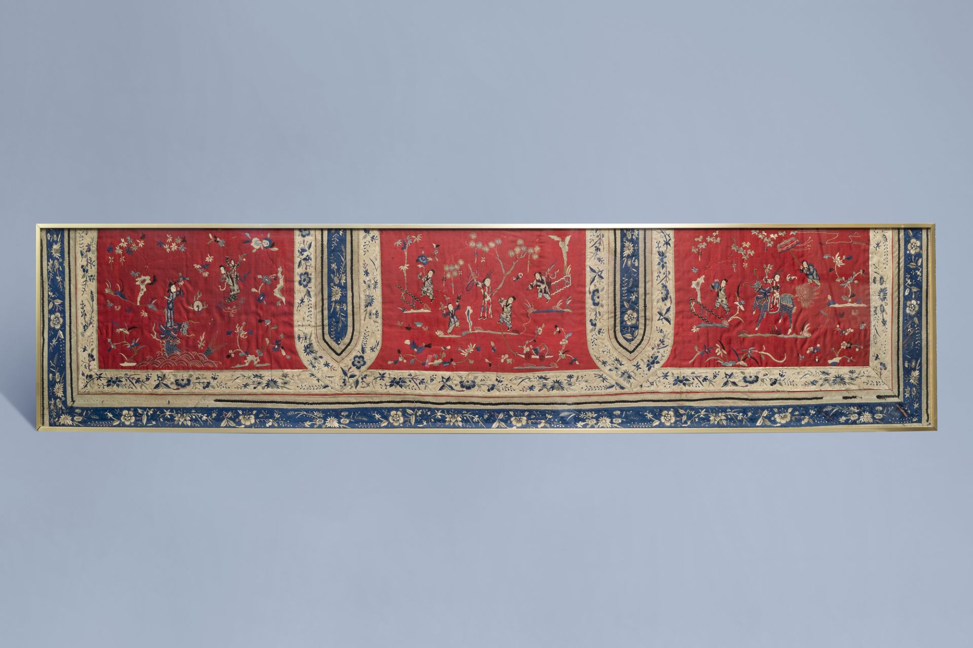 A Chinese framed embroidered altar cloth with playing children and floral design, 19th C.