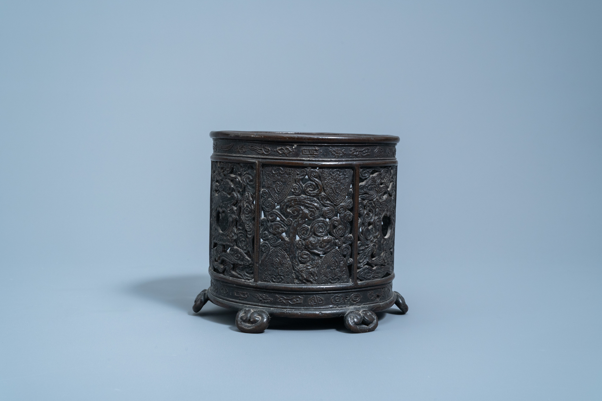 An inscribed Chinese reticulated bronze brush pot, Ming - Image 4 of 7