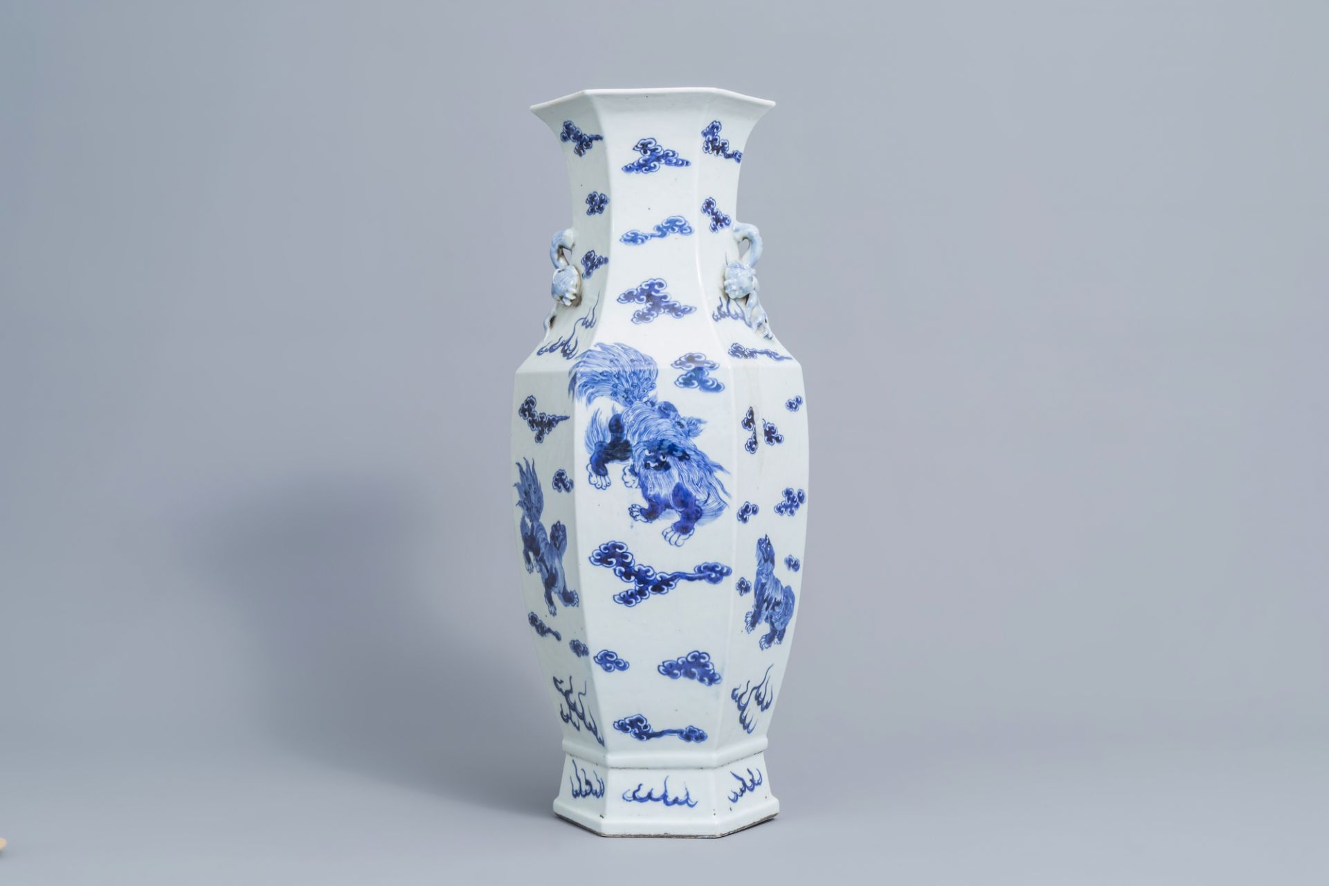 A hexagonal Chinese blue and white 'Buddhist lions' vase, 19th C.