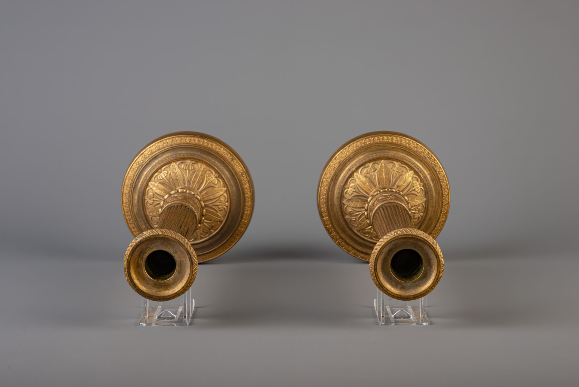 A pair of French Neoclassical gilt bronze candlesticks, 19th C. - Image 5 of 7