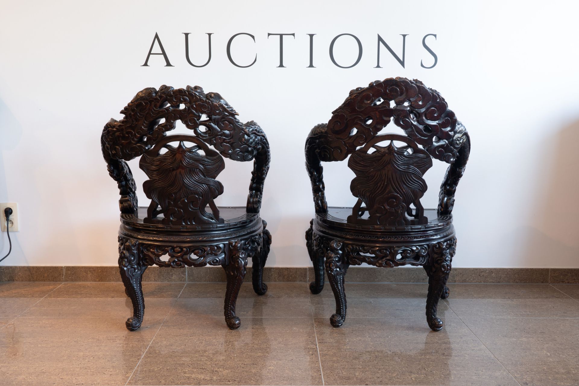 A pair of Chinese or Japanese carved wooden 'dragon' chairs, 19th/20th C. - Image 5 of 8