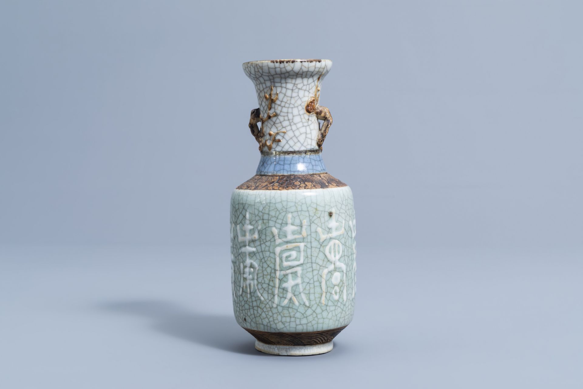 A Chinese Nanking crackle glazed celadon vase with relief design, 19th C. - Image 3 of 6