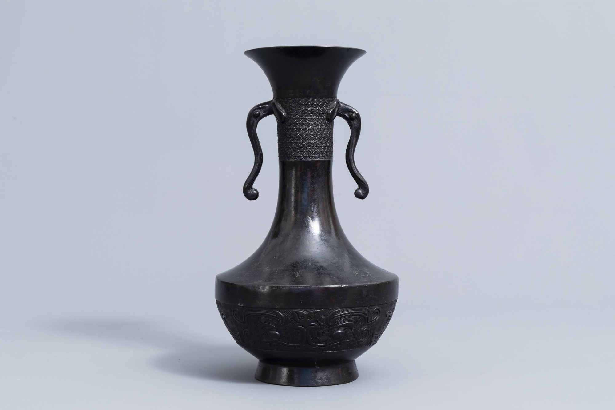 A Japanese bronze elephant head handled vase, Meiji, 19th C. - Image 4 of 10