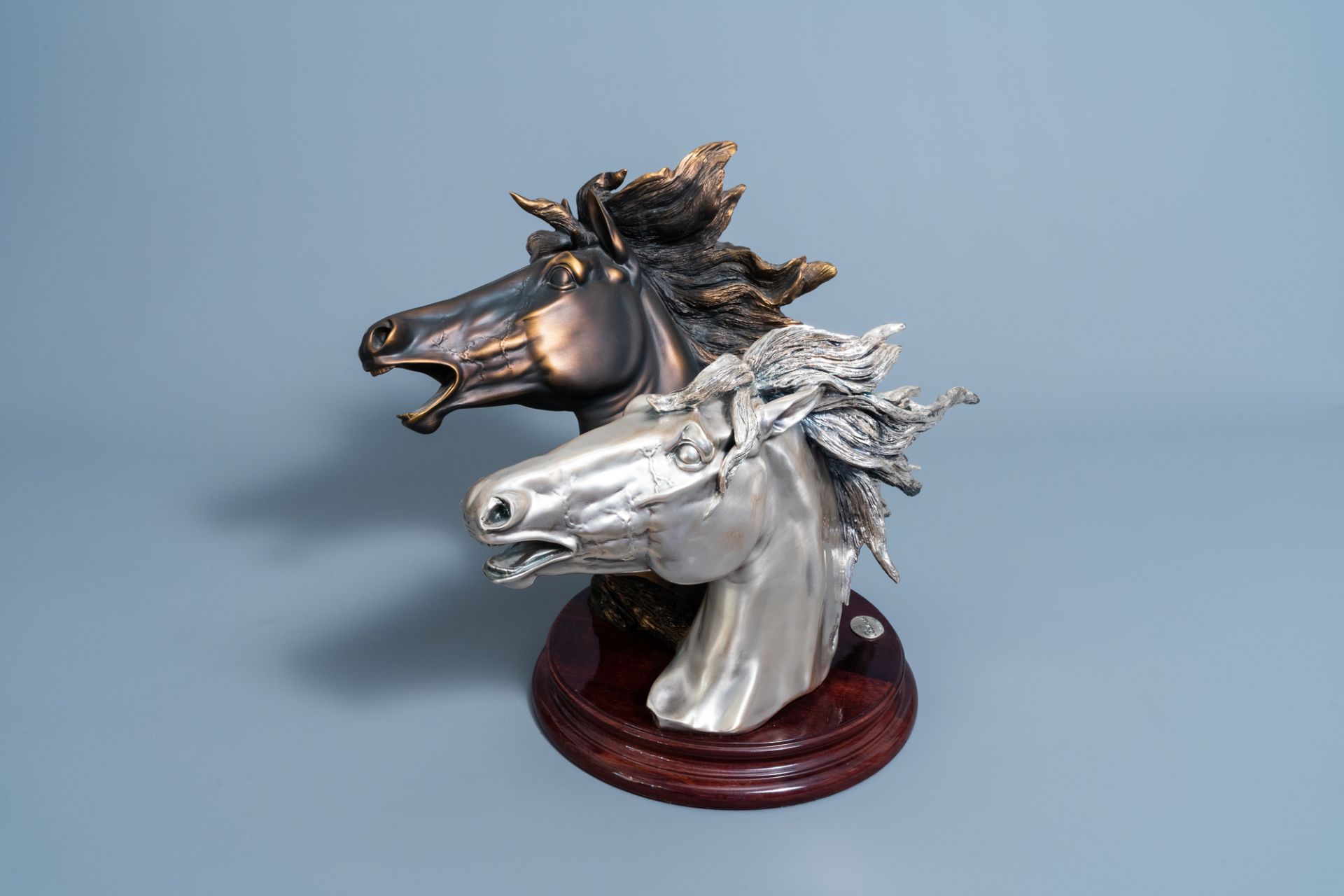 Illegibly signed: A silver plated and a patinated horse's head, Brunel, Italy, dated 1997