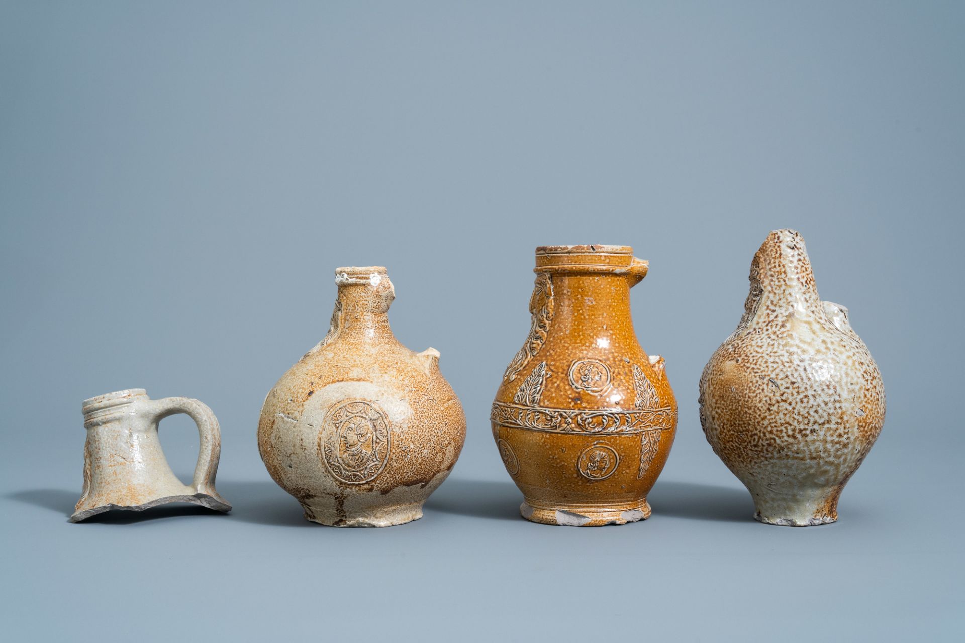 Three German stoneware bellarmine jugs and a neck fragment, 16th/17th C. - Image 4 of 8