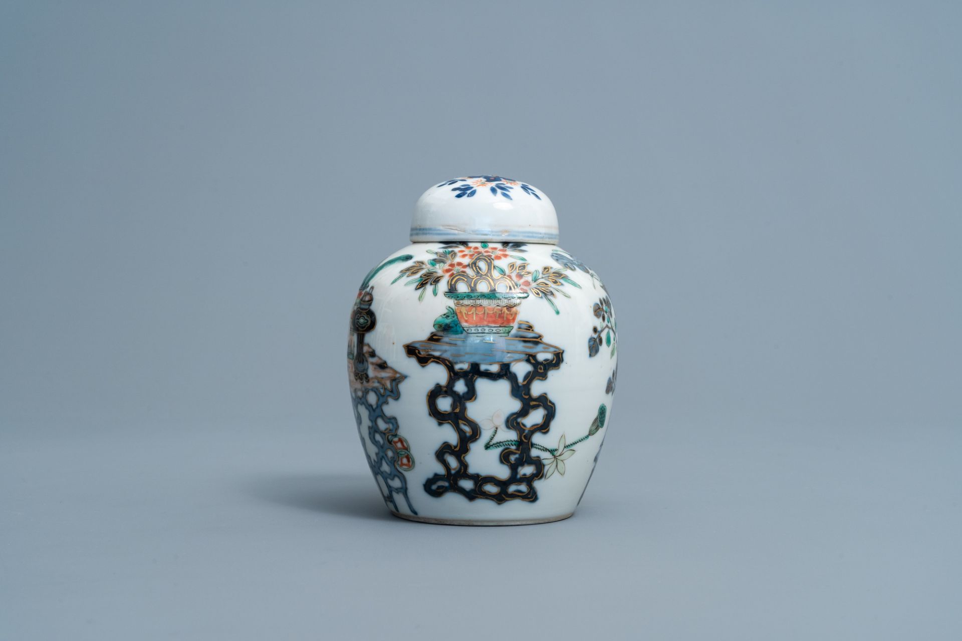 A Chinese doucai 'antiquities' jar and cover, Kangxi mark, 19th C. - Image 4 of 7
