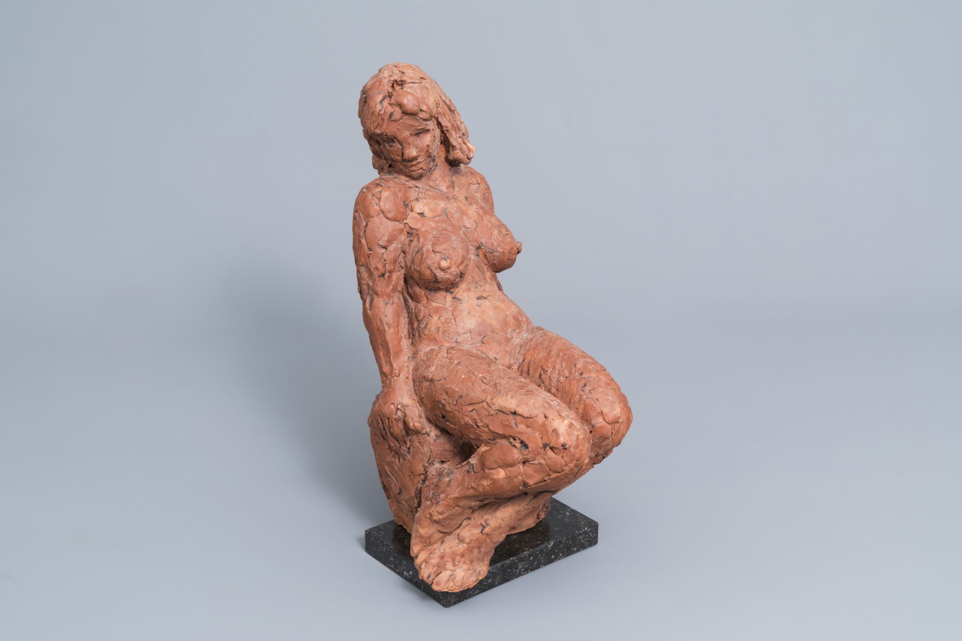 Jos De Decker (1912-2000): Seated nude, terracotta on a marble base, dated 1977