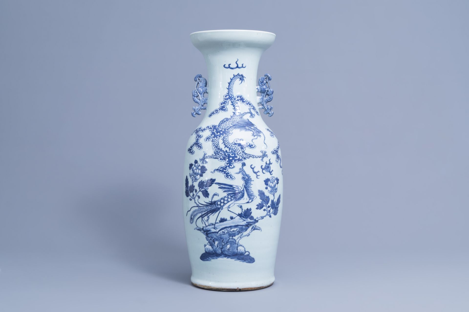 A Chinese blue and white celadon ground 'dragon and phoenix' vase, 19th C.