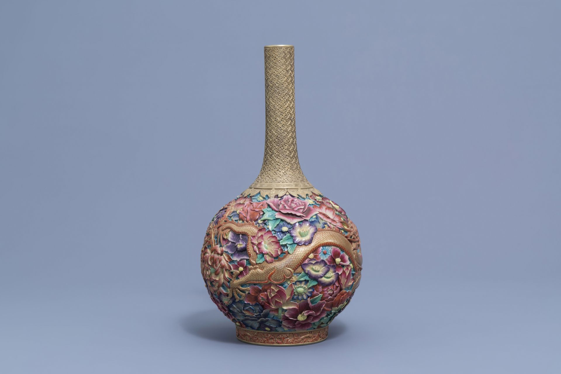 A Chinese famille rose 'dragon and phoenix' bottle vase, Qianlong mark, 20th C. - Image 3 of 7