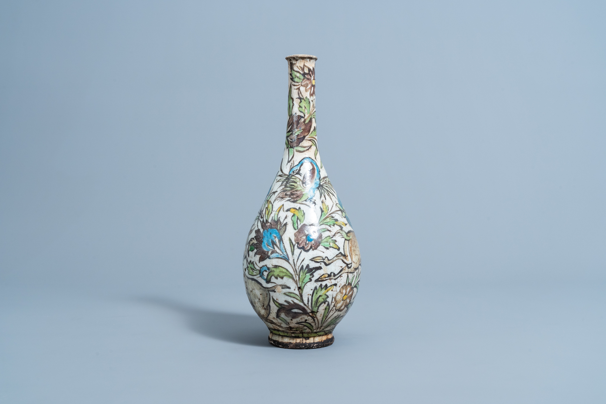 A Qajar polychrome bottle shaped vase with animals and floral design, Iran, 19th C. - Image 2 of 6