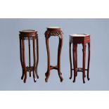 Three Chinese wood stand with marble top, 20th C.