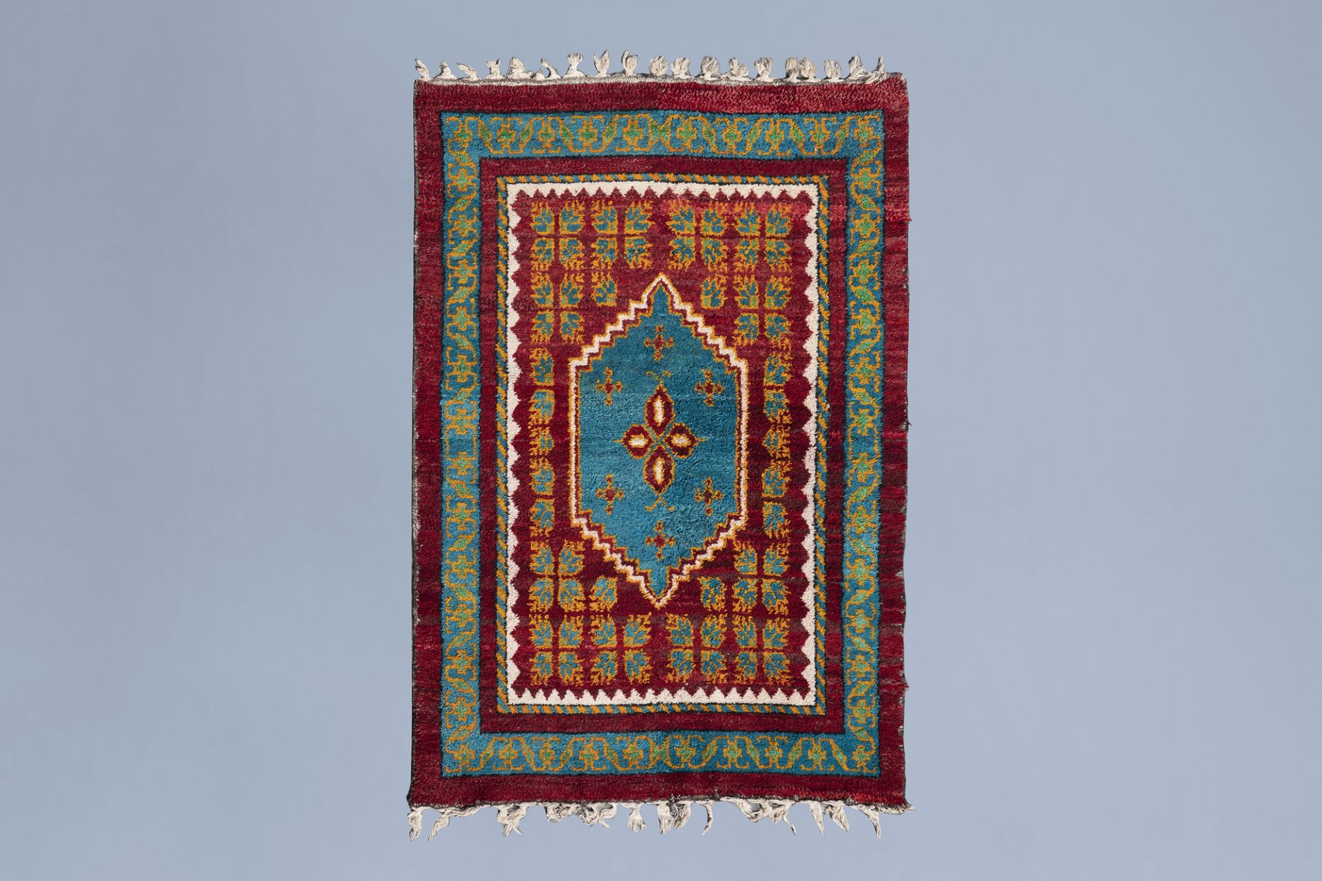 An Algerian woolen berber carpet with Crux, El-Oued, 20th C.